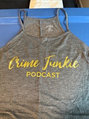 Crime Junkie Podcast Gray Tank with Gold Logo